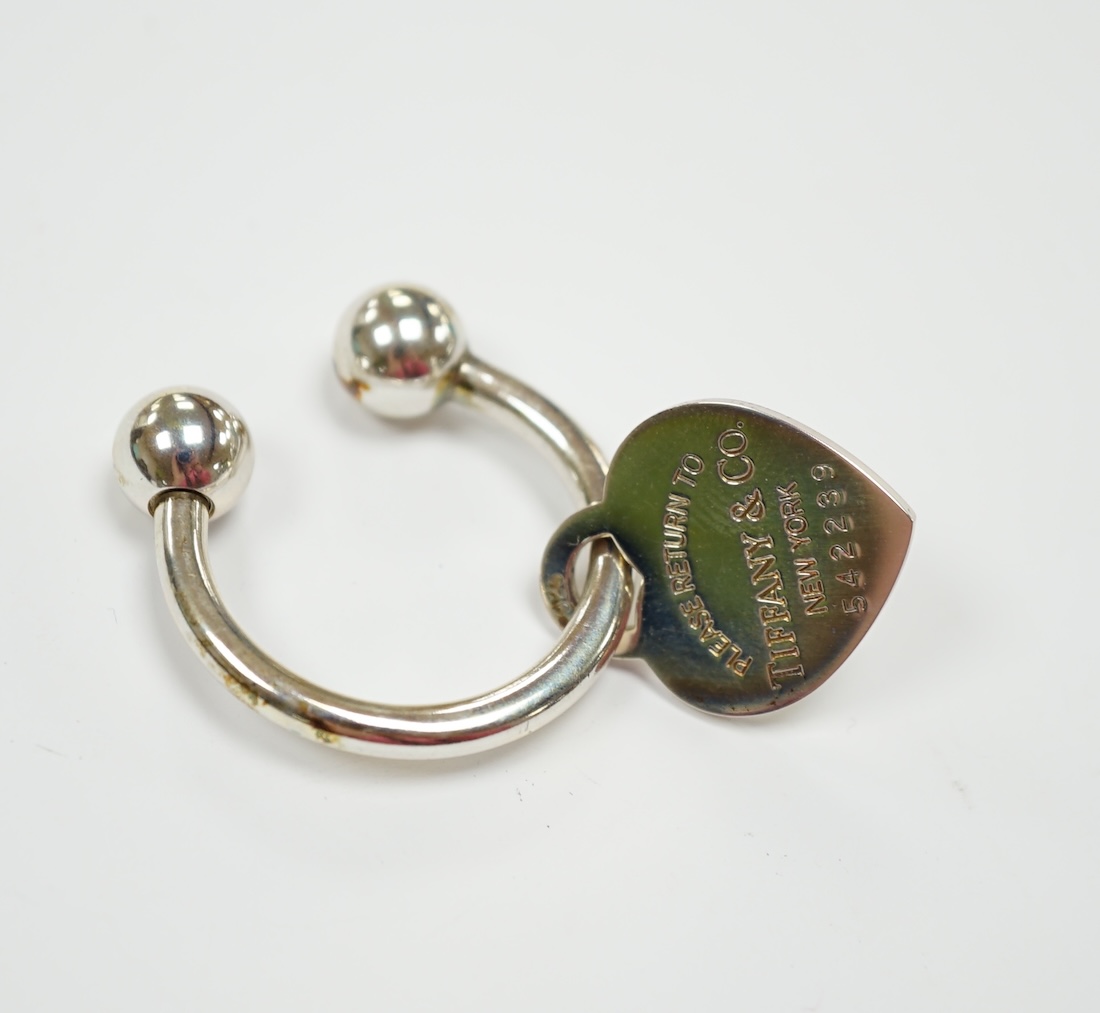 A modern Tiffany & Co 925 keyring, width 31mm, with box and papers.